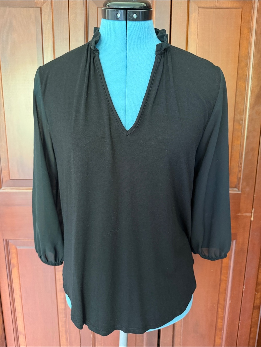 Black three-quarter length sleeve top. Kim & Cami. Size Small.